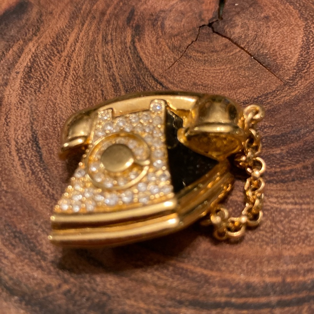 Vintage Swarovski gold colored rotary telephone with crystals.